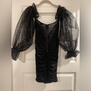 Black stretch mini dress like new.   Worn once